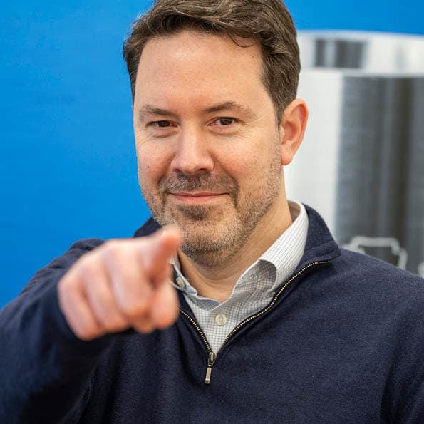 man pointing finger forward