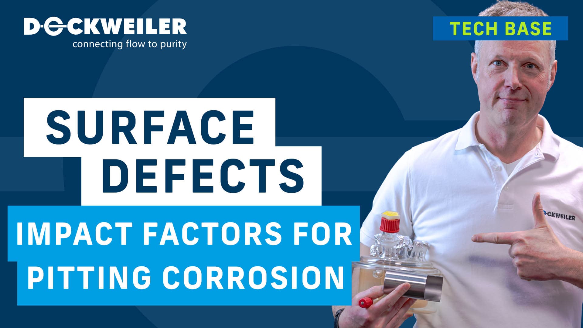 Title slide from a Dockweiler training session on factors influencing pitting corrosion. A person is presenting a metal pipe and a test vessel. Visible text: “Impact Factors for Pitting Corrosion.”